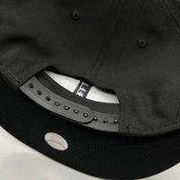 SF Giants “Upside Down” NE (Black/White) Snapback