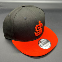 SF Giants “Upside Down” NE (Black/Orange) Snapback